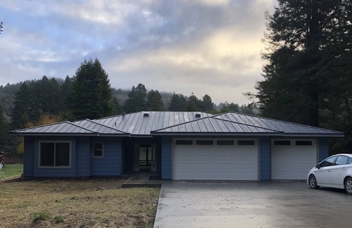 Crescent City House | Bright, open concept, family friendly house, private sandy beach on the river