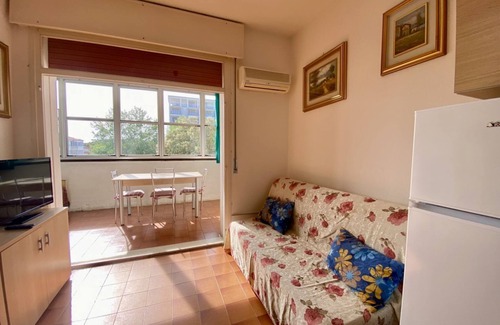 Lido delle Nazioni Apartment | Bright Studio flat, just 50 meters from the beach with air conditioning and next to main shops