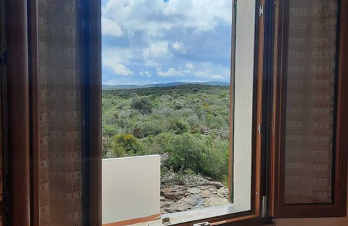 Calasetta House | Bright Villa in a green oasis with sea view