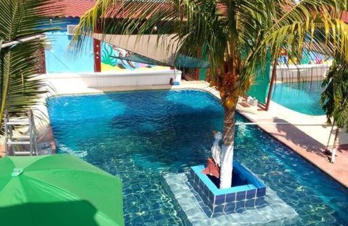 Monterrico Apartment | Bungalow Vitral comedor,cocina equipada y piscina