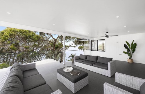 Shoalhaven Heads House | By The River: Large holiday home with river frontage. 2 min walk to the beach.