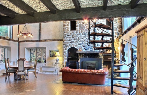Sainte-Marguerite-du-Lac-Masson House | A Swiss Chalet on Doncaster river + Private Mini Island
