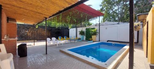 Papare House | CABAÑA LAS MARIAS, Climatizada, Piscina y BBQ