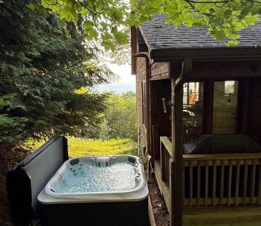 Boone House | Cabin with amazing long-range mountain views, hot tub, fire pit, EV connection