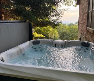 Boone House | Cabin with amazing long-range mountain views, hot tub, fire pit, EV connection