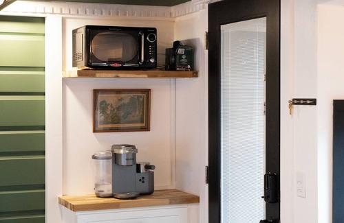Grimms Landing Cabin | Caboose Tiny Home in Frazier’s Bottom, WV