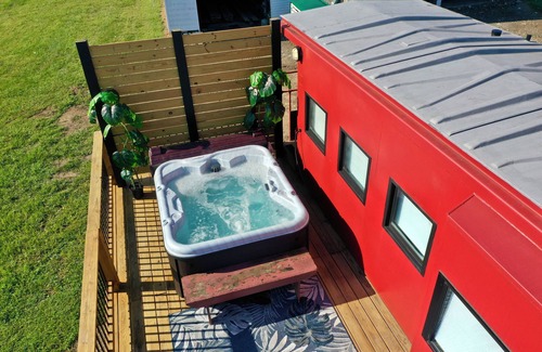 Grimms Landing Cabin | Caboose Tiny Home in Frazier’s Bottom, WV