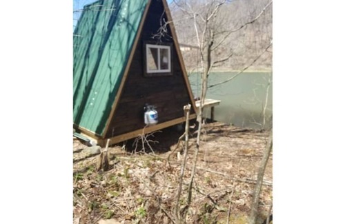 Todd RV Rental | Camp Bigfun: Waterfront Tiny Cabin A-frame Solar Power Off Grid