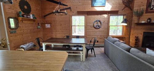 Swanton House | Camp Valentine- charming 3 bedroom cabin with hot tub and fireplace in private setting