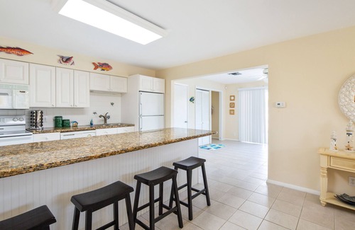 Marathon House | Canal-front, dog-friendly home with heated pool, seawall dock & grill