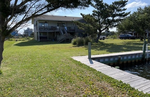 Frisco House | Canal Front Home with a Dock and Hot Tub minutes from the beach!