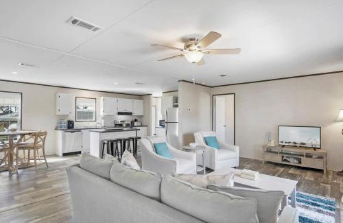 Butler Beach House | Canal Home Dock Walk to Beach Kayaks SUP Fishing