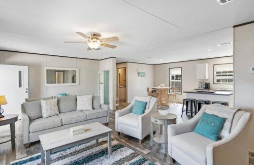 Butler Beach House | Canal Home Dock Walk to Beach Kayaks SUP Fishing