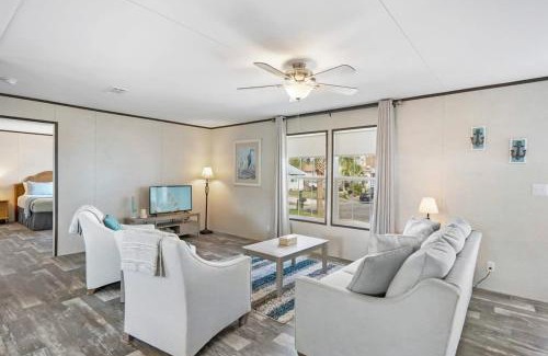 Butler Beach House | Canal Home Dock Walk to Beach Kayaks SUP Fishing