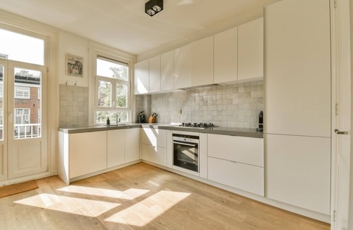 Helmersbuurt Apartment | Canal-View Apartment with Large Rooftop Terrace