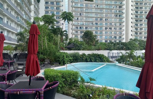 Bonifacio Global City Hotel | Capital O 950 AHM Suites at ACQUA