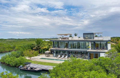 Placencia Villa | Casa Balam, A Stunning Waterfront Villa, w/Boat, 40ft Pool & Rooftop Bar