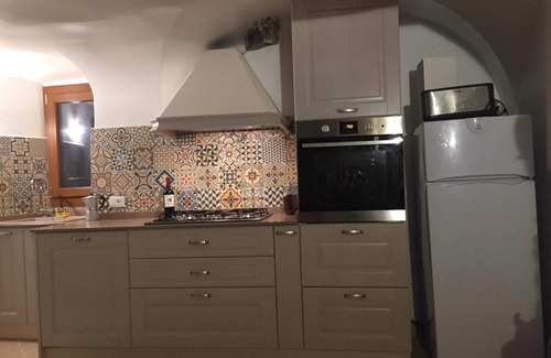Badalucco Apartment | Casa dei Rossi - typical house with 3 bedrooms, solarium, cantina, living room
