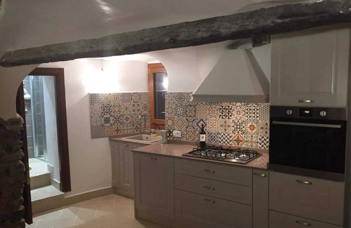 Badalucco Apartment | Casa dei Rossi - typical house with 3 bedrooms, solarium, cantina, living room