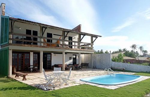 Taiba House | Casa Jangada - Incrível vista mar com Piscina e a melhor localização na Beira Mar da Taíba