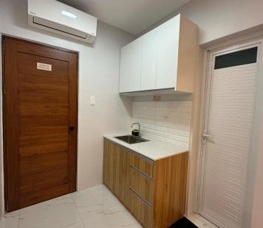 Imus Apartment | Casa Leveria Unit 3 with Patio, Inquire Parking Availability