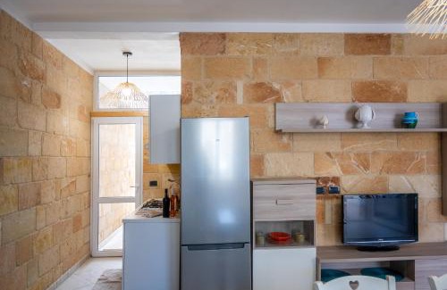 Sant'Isidoro Apartment | Casa Vacanze Acquamarina a Sant Isidoro a 100 m dal mare