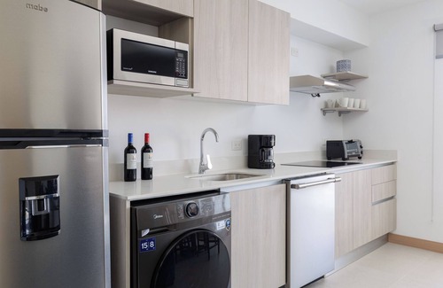 Barrio Santa Lucia Apartment | Casago Brand New Stunning Ocean View Condo for the Ultimate Coastal Escape