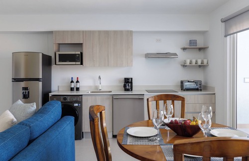 Barrio Santa Lucia Apartment | Casago Brand New Stunning Ocean View Condo for the Ultimate Coastal Escape