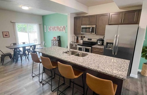 Spokane Apartment | Central 3/2, garage, private yard, walk to arena, EV charger