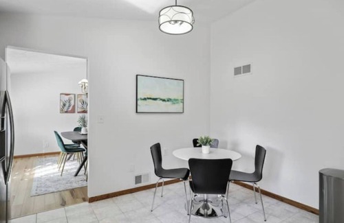 West Omaha House | Central Location+ 2 living spaces+ covered patio!