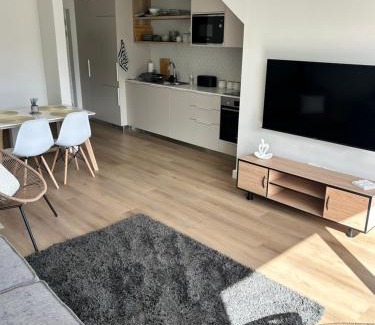 Hermanus City-Centre Apartment | Central Town Duplex with Pool, BBQ & Mountain View