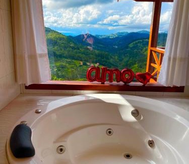 Goncalves Ski Chalet | Chalé 2 hidromassagem lareira e cozinha