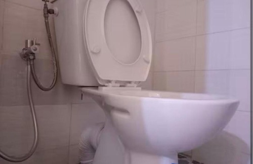 Ngor House | Chambre spacieuse propre et serviettes