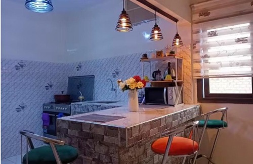Ngor House | Chambre spacieuse propre et serviettes