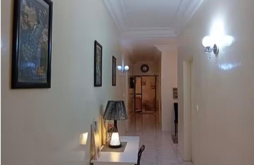 Ngor House | Chambre spacieuse propre et serviettes