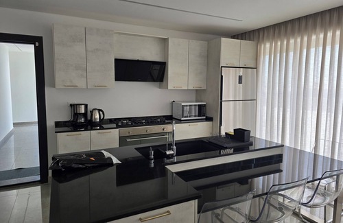 Suwailih Apartment | Charming 2-bedroom rooftop apartment with mountain view in Amman