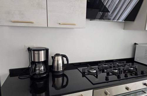 Suwailih Apartment | Charming 2-bedroom rooftop apartment with mountain view in Amman