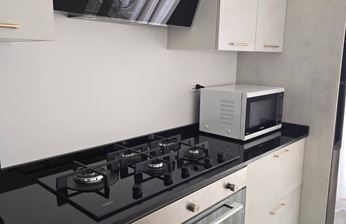 Suwailih Apartment | Charming 2-bedroom rooftop apartment with mountain view in Amman