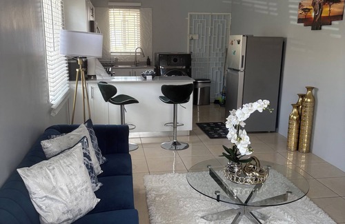 Portmore House | Charming 2bedroom home in gated community close to Hellshire beach.