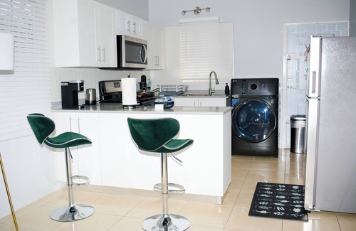 Portmore House | Charming 2bedroom home in gated community close to Hellshire beach.