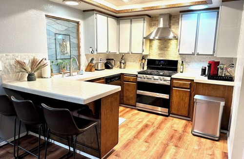 Spring Valley House | Charming 3-bedroom house by the Pond w Waterfall, Playground, and Trampoline.