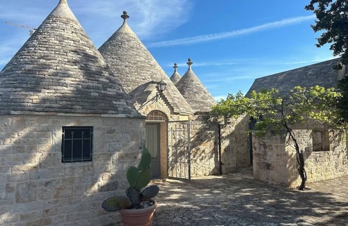 Locorotondo Villa | Charming 300-Year-Old Trullo with Large Private Pool, Garden, Pizza Oven & BBQ