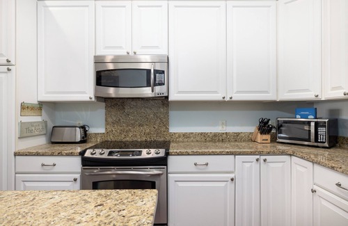Waters Edge House | Charming 3BR Folly Beach Townhome: Water Views, Pool Access & Steps to Fun