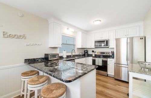 Emerald Isle Cottage | Charming 5-bedroom oceanfront duplex with wonderful views