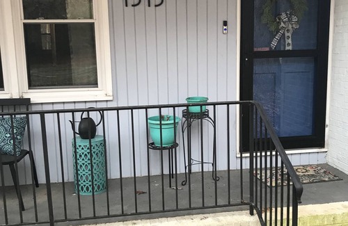 Hillsborough House | Charming brick ranch with spacious fenced yard.