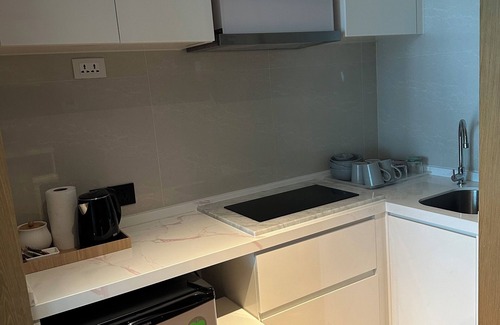 Rawai Apartment | Charming deluxe room in 5-star hotel in Nai Harn with gym and kids water park