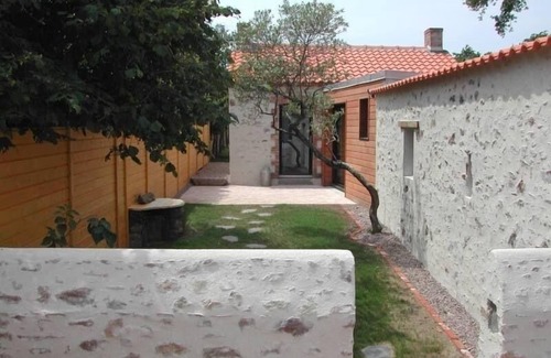 Saint-Brevin-les-Pins Cottage | Charming Stone Cottage Near Beaches with Enclosed Garden and Sports Amenities