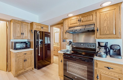 Conover House | Charming lakefront home with dock, fireplace, streaming, lake views, W/D, & AC