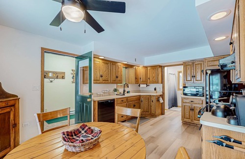 Conover House | Charming lakefront home with dock, fireplace, streaming, lake views, W/D, & AC