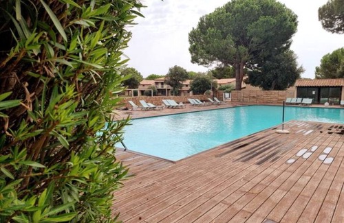 Cala Rossa Apartment | Charming studio 1 km from the beach with swimming pool.